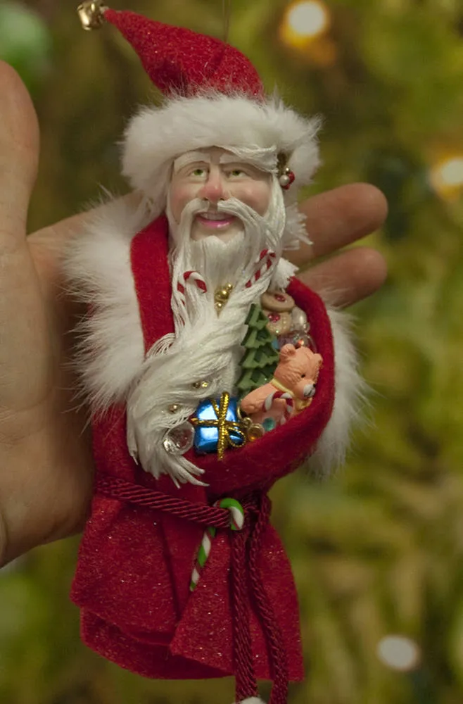 Santa Claus Christmas decor - Flowing white beard sprinkled with candy canes - White fur trimmed red coat & cap with gold jingling bell